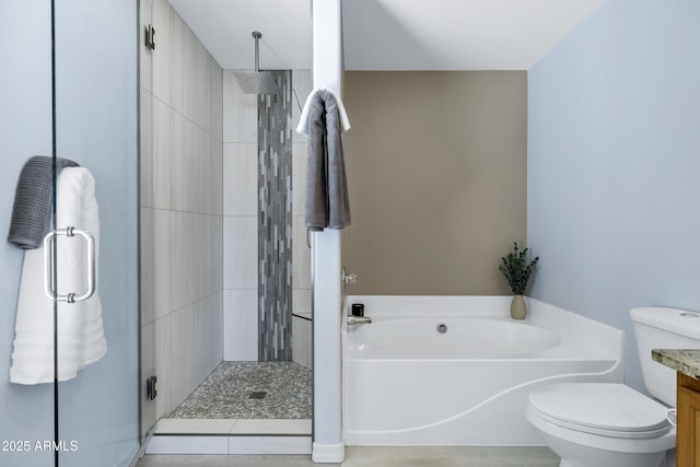 full bath featuring vanity, a garden tub, toilet, and a stall shower