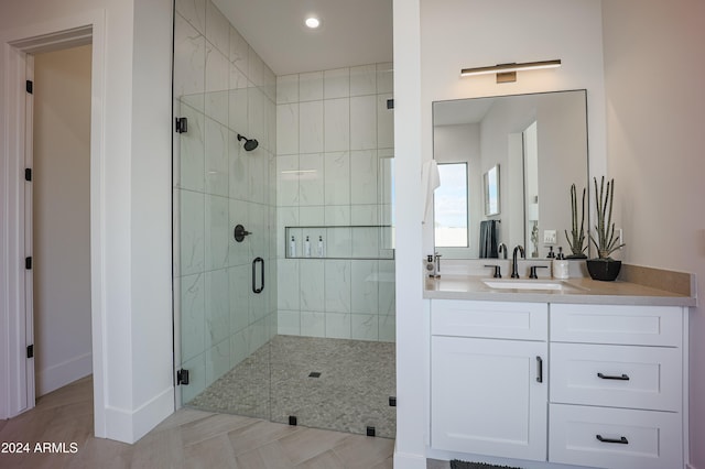 bathroom featuring vanity and walk in shower