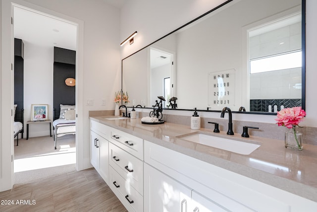 bathroom featuring vanity and walk in shower