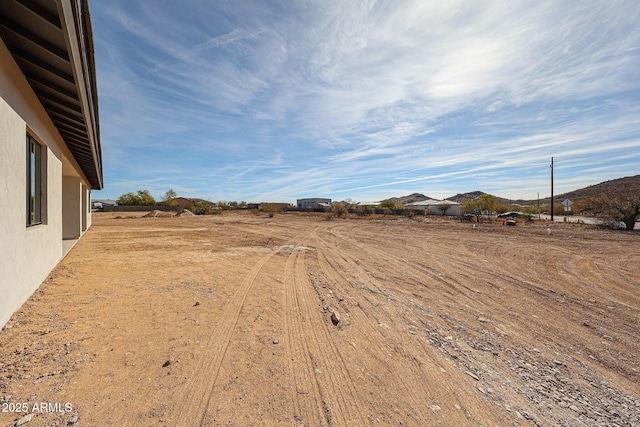 view of yard with a mountain view