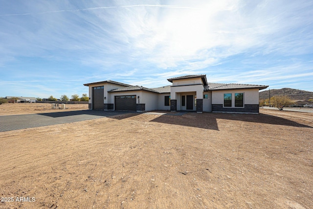 view of front of house featuring a garage