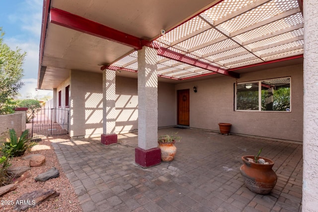 view of patio featuring a pergola