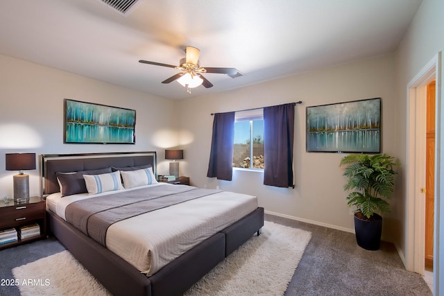 carpeted bedroom with a ceiling fan, visible vents, and baseboards