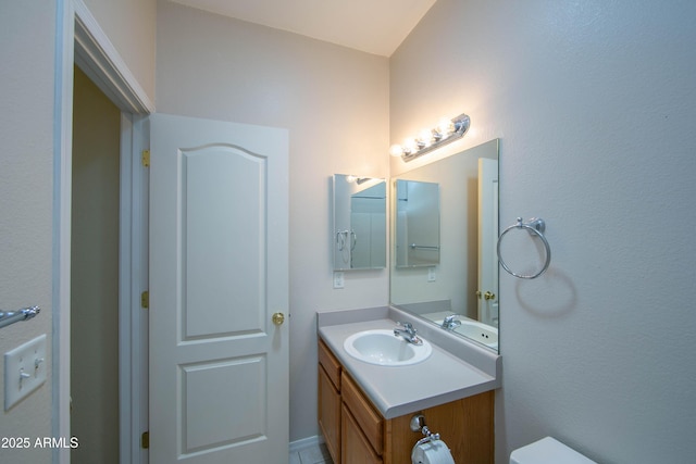 half bathroom with vanity