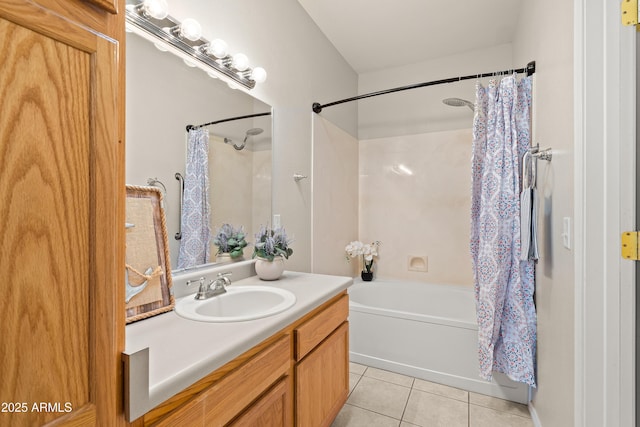 full bathroom featuring tile patterned flooring, shower / bath combination with curtain, and vanity