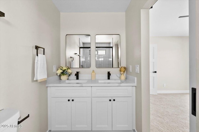 2559 E Broadway Rd, Phoenix, AZ 85040 - bathroom featuring double vanity and toilet