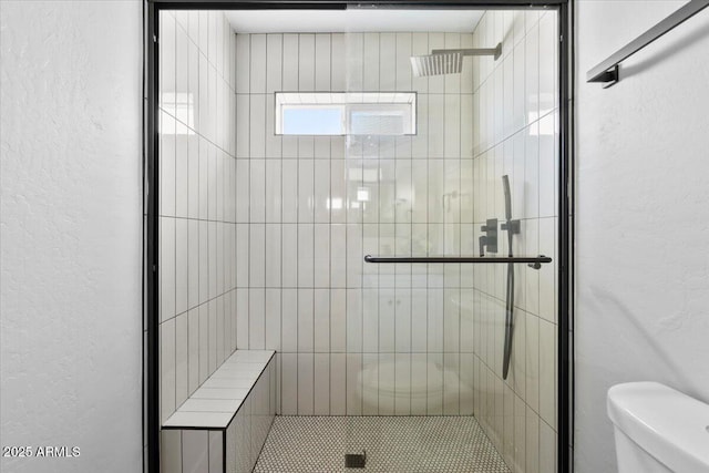 2559 E Broadway Rd, Phoenix, AZ 85040 - bathroom featuring a shower stall and a textured wall