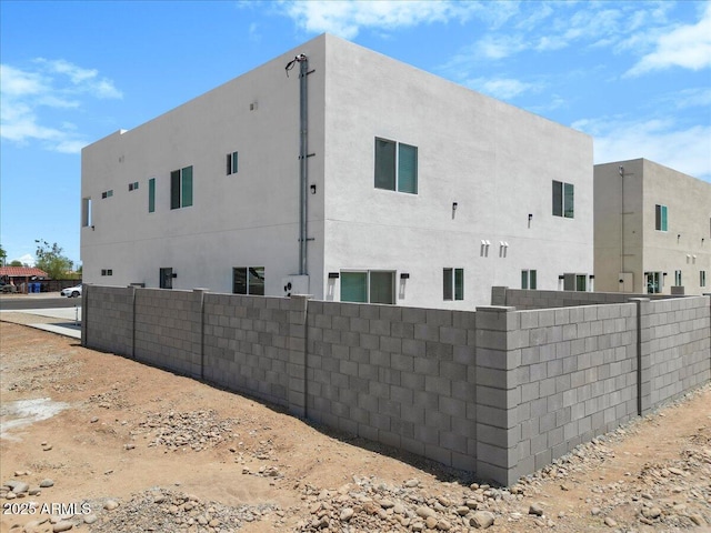 2559 E Broadway Rd, Phoenix, AZ 85040 - view of side of property featuring stucco siding