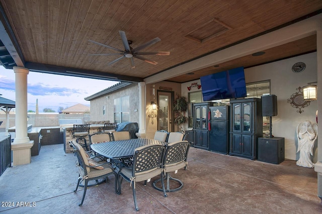 view of patio with ceiling fan