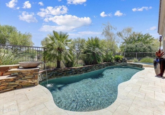 view of pool with a fenced in pool, a patio, and a fenced backyard
