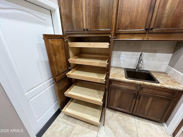 room details with backsplash and a sink