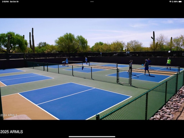 view of sport court featuring community basketball court and fence