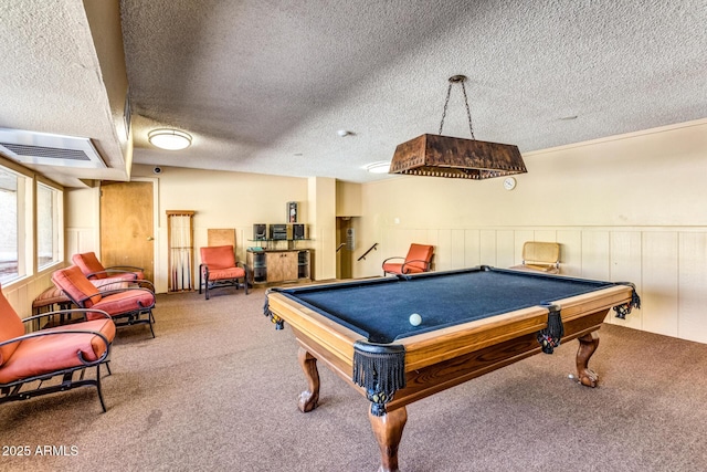 game room featuring carpet flooring, a textured ceiling, and billiards