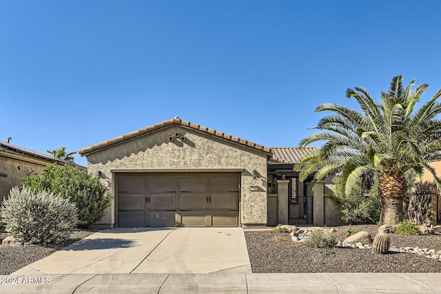 view of front of property featuring a garage