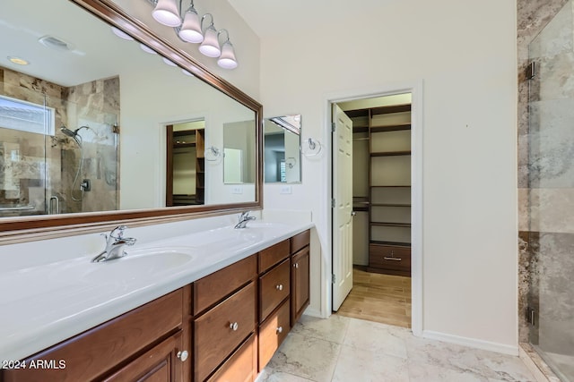 bathroom with vanity and walk in shower