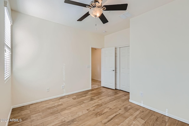 unfurnished room with light hardwood / wood-style flooring and ceiling fan