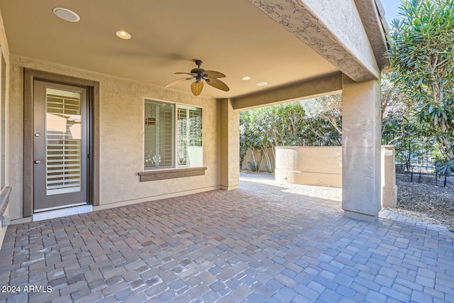 view of patio featuring ceiling fan