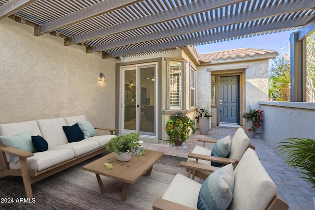 view of patio featuring outdoor lounge area and a pergola