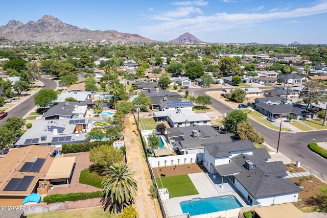 birds eye view of property featuring a mountain view