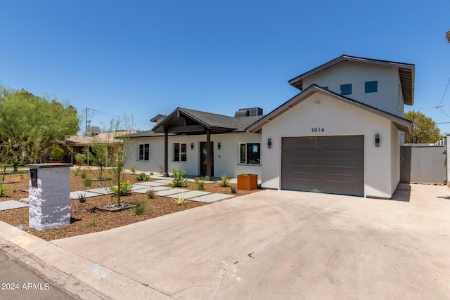 view of front of property with a garage