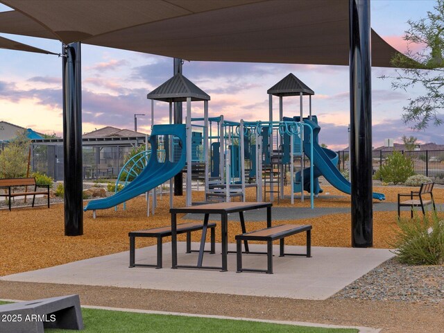 16010 W Desert Hollow Dr, Surprise, AZ 85387 - playground at dusk with fence