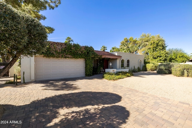 view of front of property featuring a garage