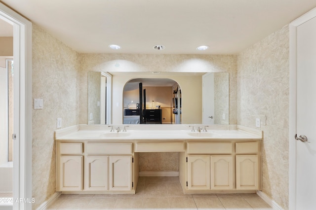 bathroom with vanity and tile patterned flooring