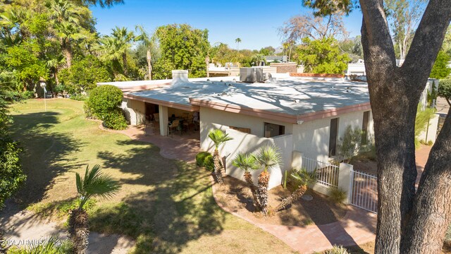 exterior space featuring a yard and a patio