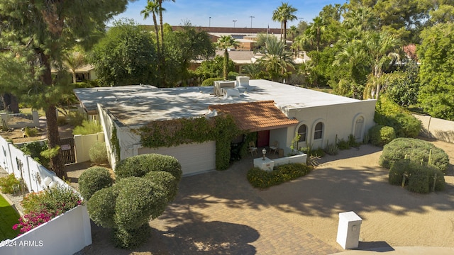 mediterranean / spanish-style house featuring a garage