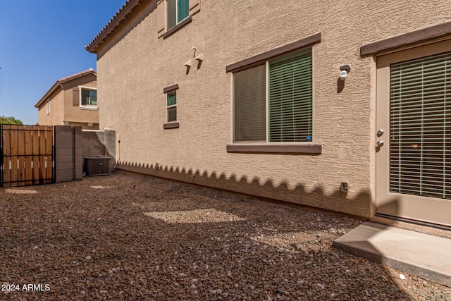 view of property exterior featuring cooling unit