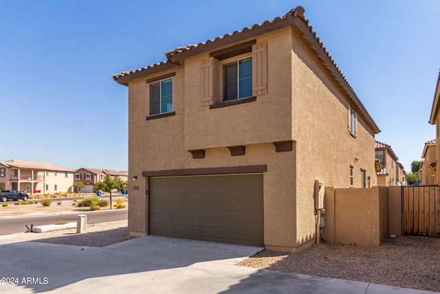 view of front of property featuring a garage