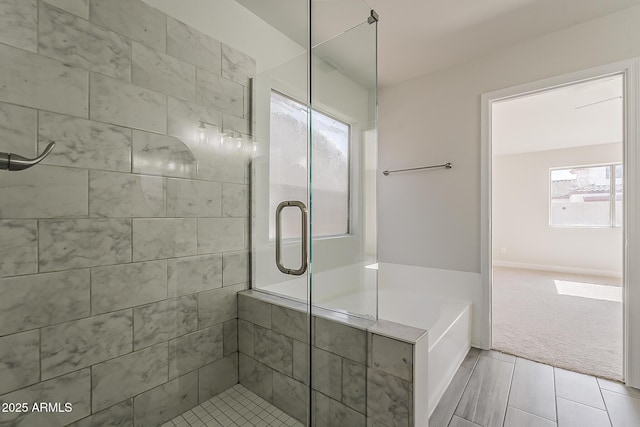 15360 N 87th Ave, Peoria, AZ 85381 - bathroom featuring a shower stall, a garden tub, and tile patterned flooring