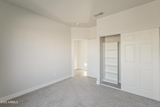 15360 N 87th Ave, Peoria, AZ 85381 - unfurnished bedroom featuring carpet, baseboards, and a closet