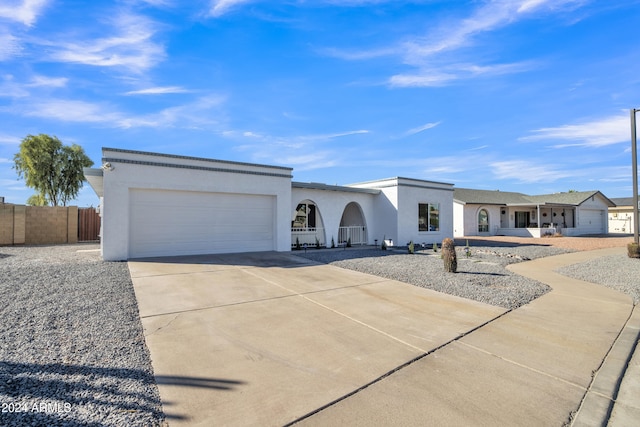 ranch-style home with a garage