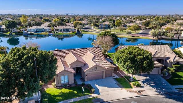 drone / aerial view featuring a water view