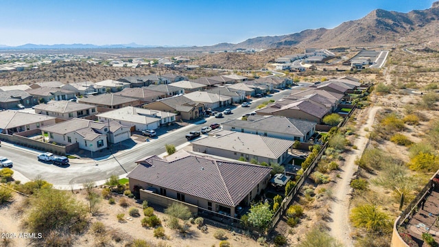 drone / aerial view featuring a mountain view