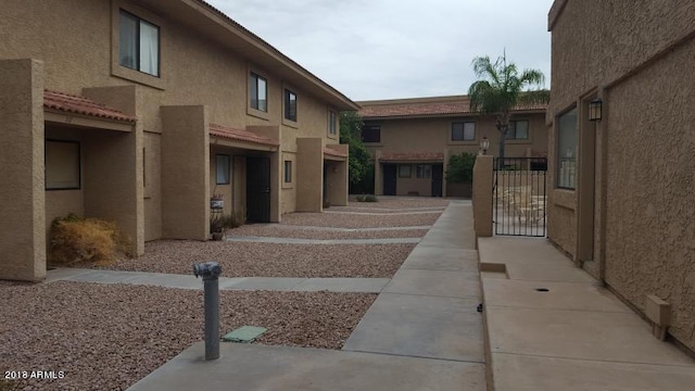 view of property's community with a gate