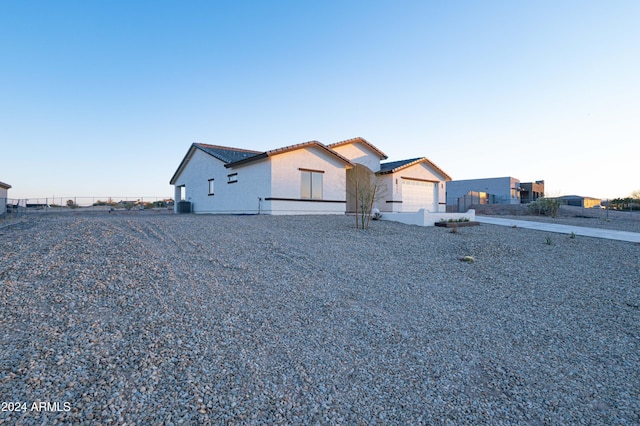 view of front of property with a garage