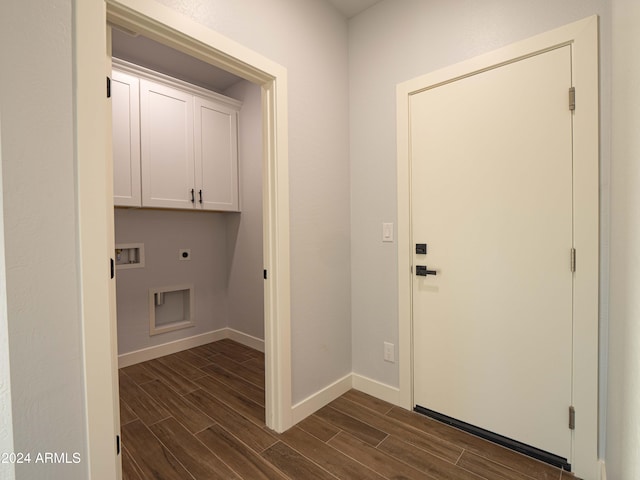 laundry room featuring hookup for an electric dryer, cabinets, dark wood-type flooring, and hookup for a washing machine