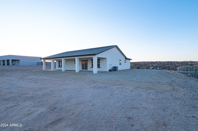 exterior space featuring central AC unit