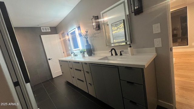 bathroom featuring vanity and tile patterned floors