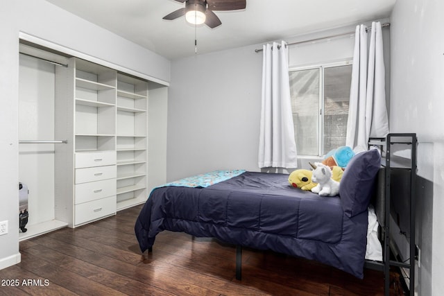bedroom with a ceiling fan and hardwood / wood-style floors