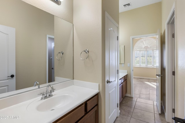 bathroom featuring vanity and tile patterned floors