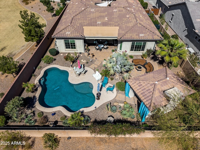 exterior space with a fenced backyard and a patio