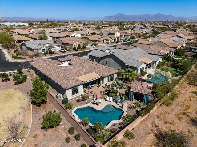 birds eye view of property featuring a residential view and a mountain view