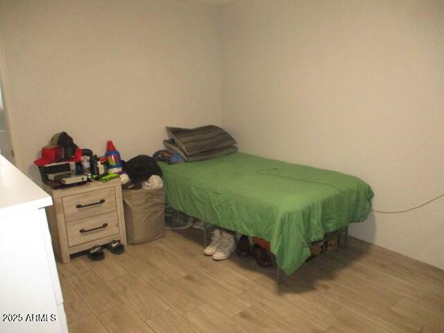 1815 E Illini St, Phoenix, AZ 85040 - bedroom featuring light wood-style flooring