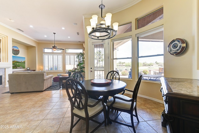 20609 N Canyon Whisper Dr, Surprise, AZ 85387 - dining area featuring a healthy amount of sunlight, ornamental molding, light tile patterned flooring, and a notable chandelier