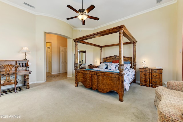 20609 N Canyon Whisper Dr, Surprise, AZ 85387 - carpeted bedroom featuring crown molding, arched walkways, baseboards, and visible vents