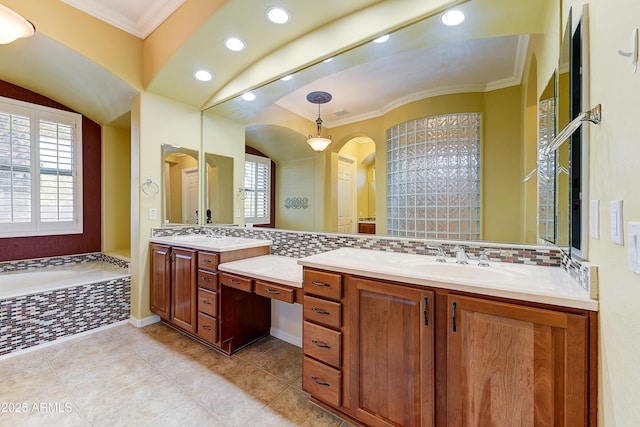 20609 N Canyon Whisper Dr, Surprise, AZ 85387 - full bathroom with decorative backsplash, ornamental molding, a garden tub, and vanity