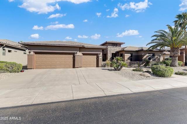 20609 N Canyon Whisper Dr, Surprise, AZ 85387 - prairie-style house featuring a garage, stucco siding, driveway, and a tile roof